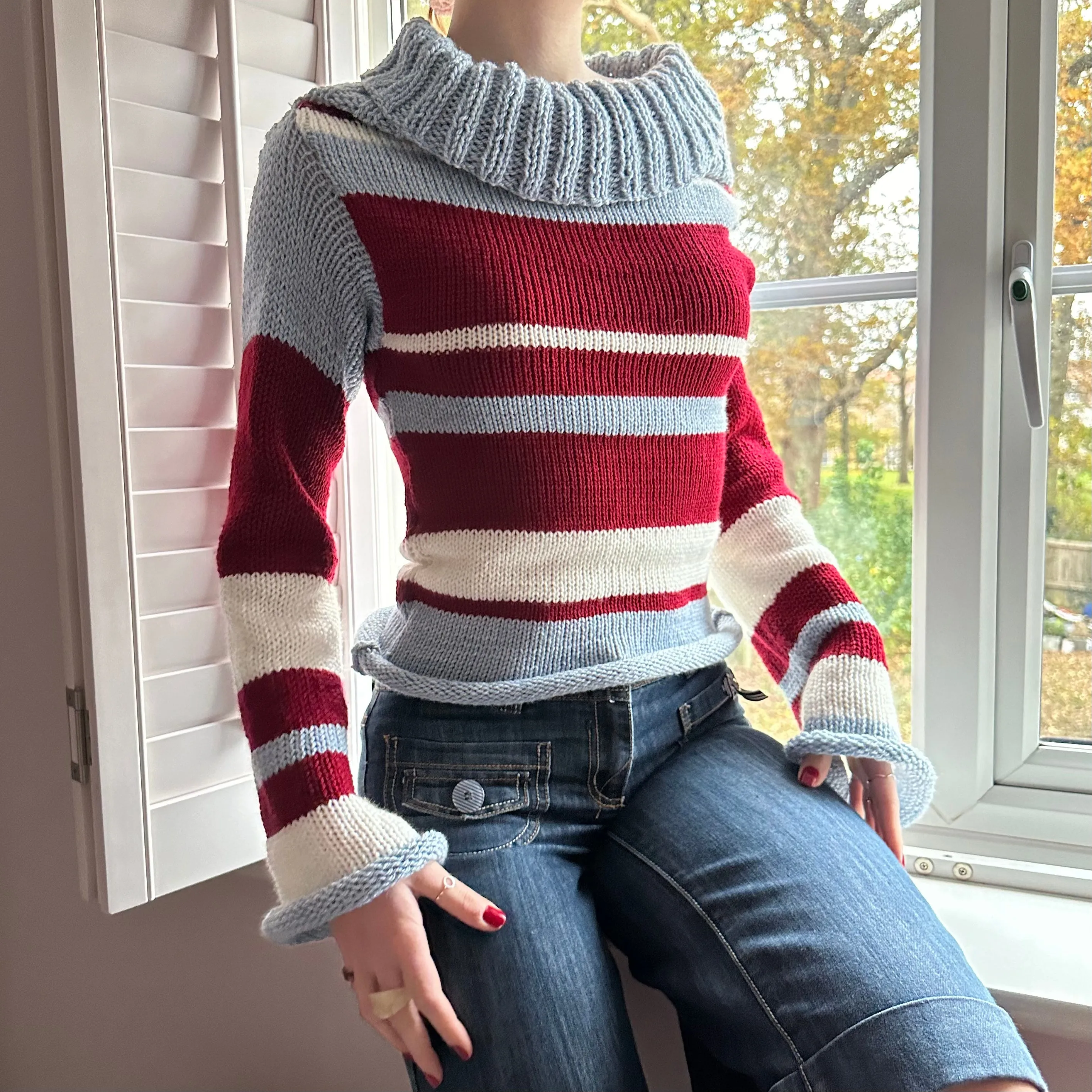 The Raya Jumper - striped cream, red and baby blue roll neck knitted jumper